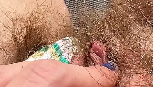 Amateur Hairy Girl Mastubates in Closeup with Huge Clit