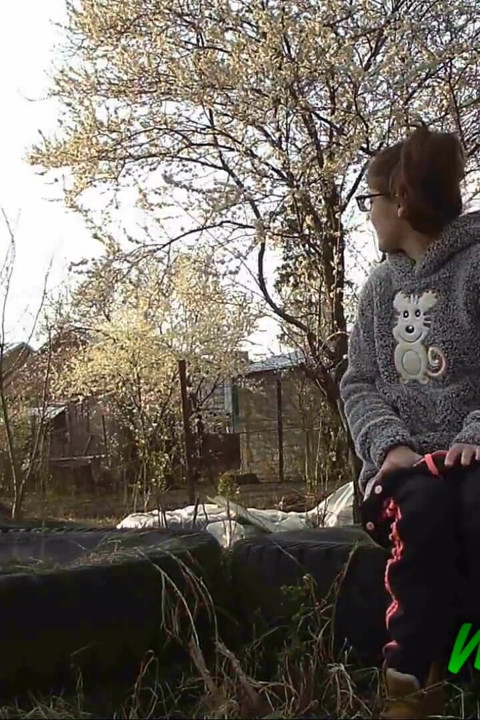 Peeing on some old tires in the yard