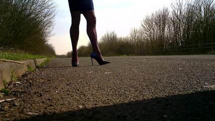 walking in blue black ombre shoes.