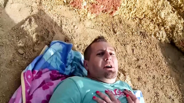 Good looking German blonde pleasing a loaded cock outdoors