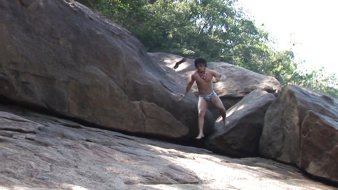 Muscle hunk get facial on beach