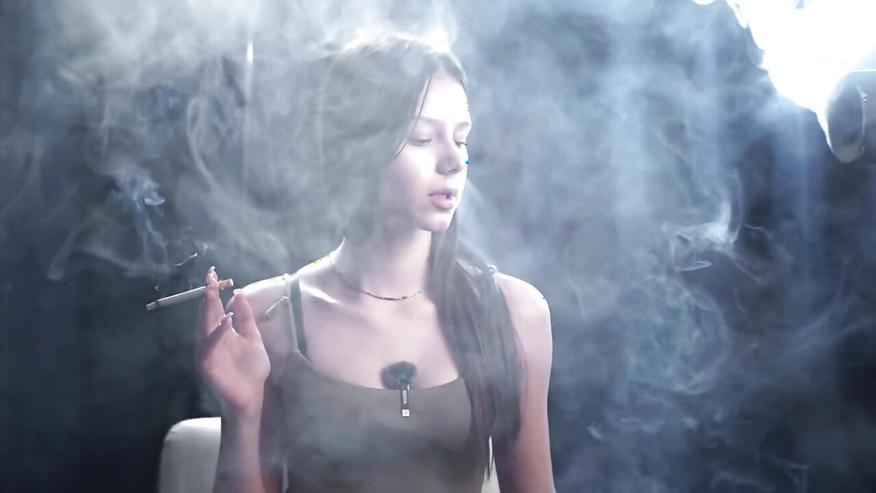 Calm Solo Smoking Session in Studio with Soft Smoke and Direct Eye Contact