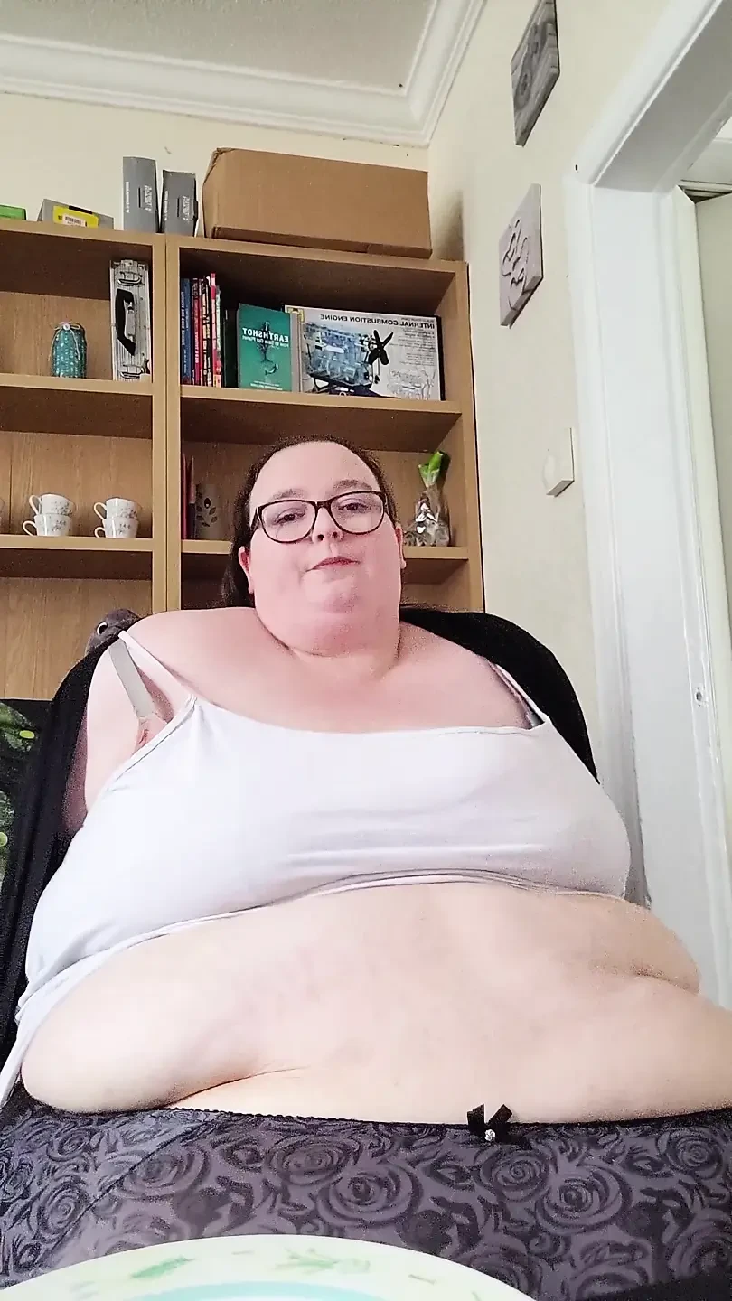 Eating cake and jiggling this massive belly