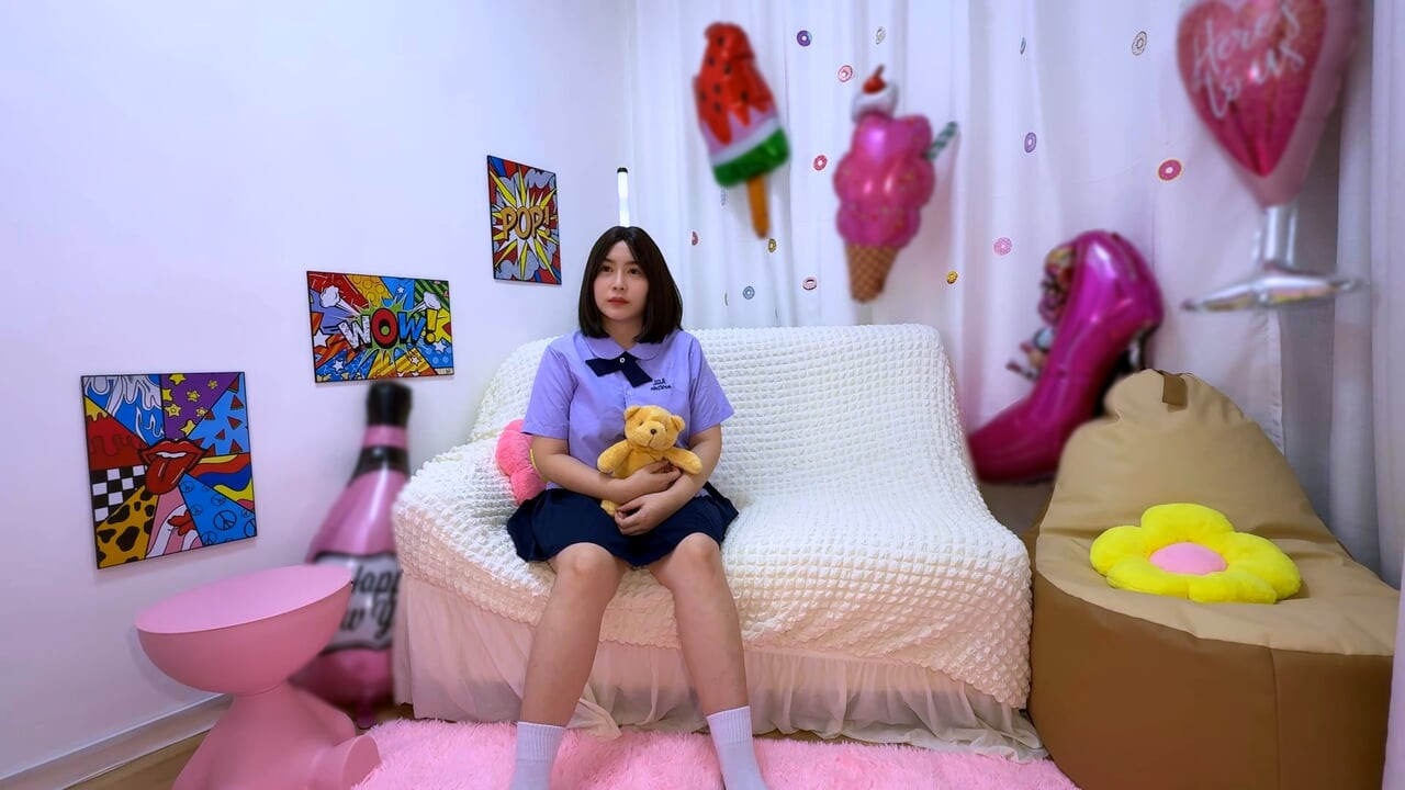 Cute teenage Thai student love teddy bear