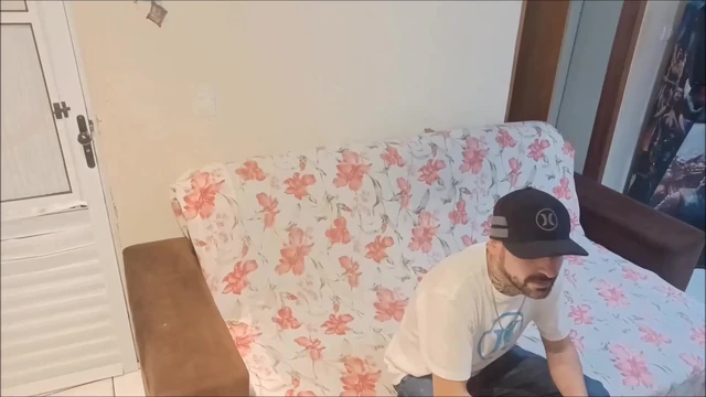 seamstress measuring customer's pants with erection
