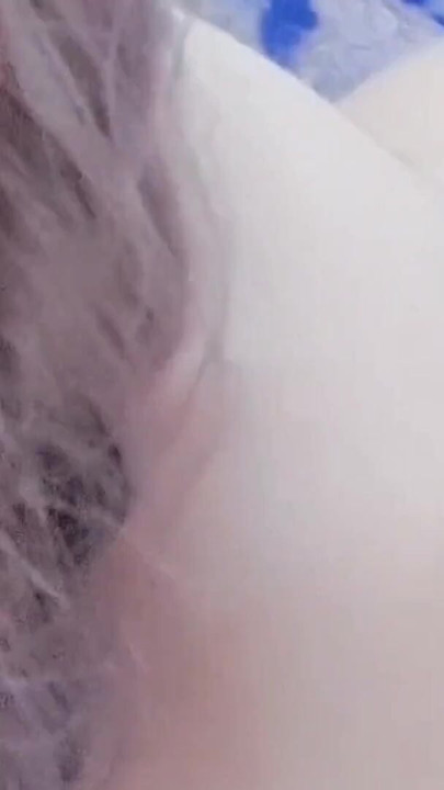 Naughty femboy peeking around corner with teasing smile | Clip 1