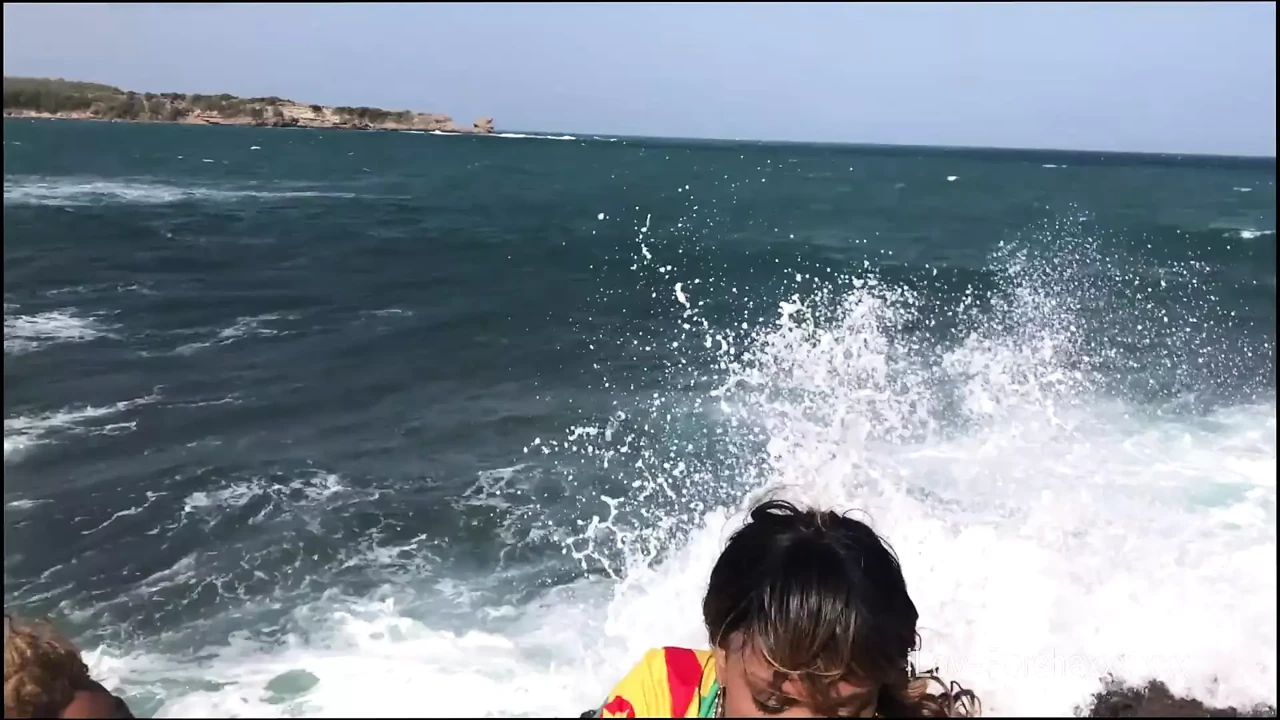 Ebony girls lick pussy on beach