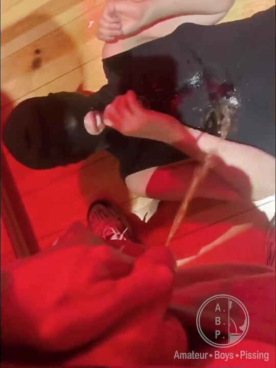 Amateur Boy Pissing in a Glass Held in His Friend's Mouth
