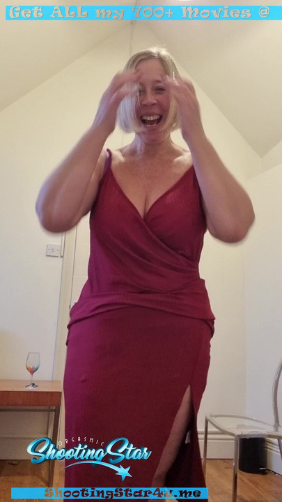Star shows her bum  in red dress