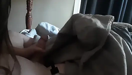 Handjob While Playing in Bed