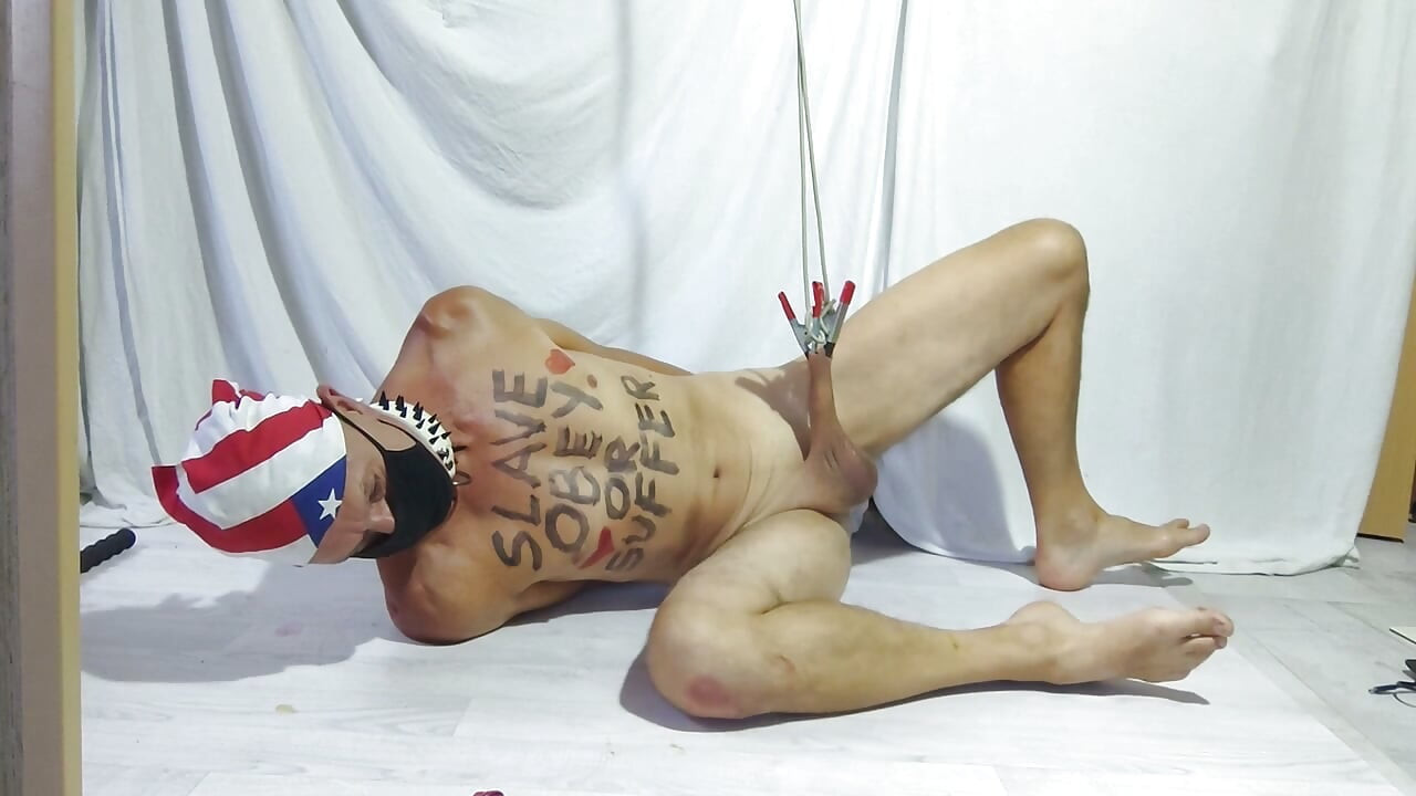dirty gay slave pig handcuffed clamps on foreskin lying on slippery floor, dildo in ass, at the end cum shows how I liked it