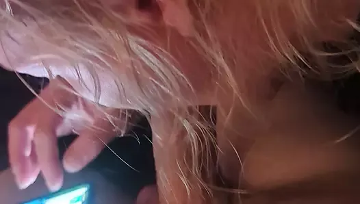Wife sucking cock while playing on her phone
