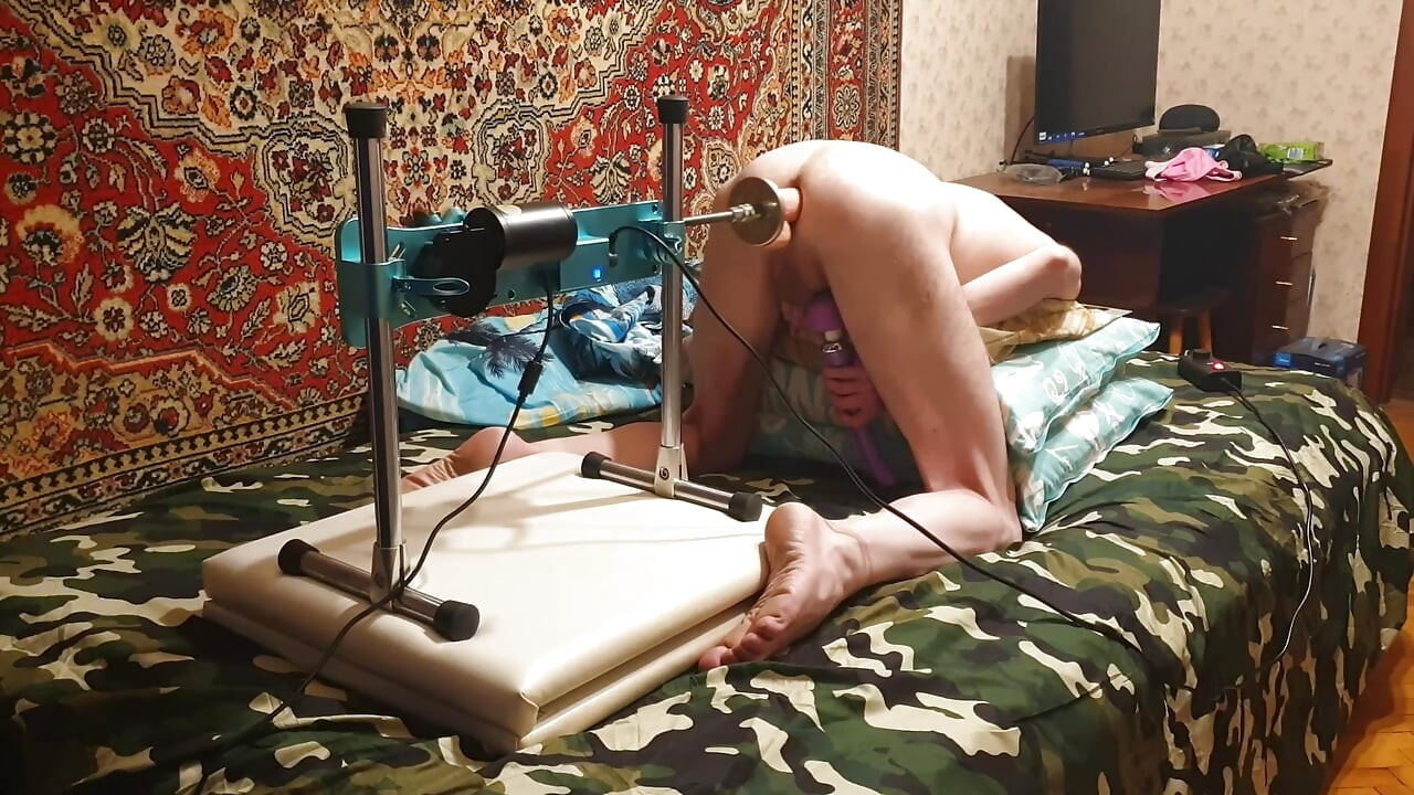 Hot gay having sex with a fuck machine
