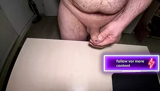 horny cumshot on table