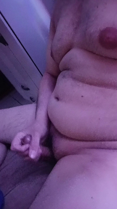 Fat guy jerks off