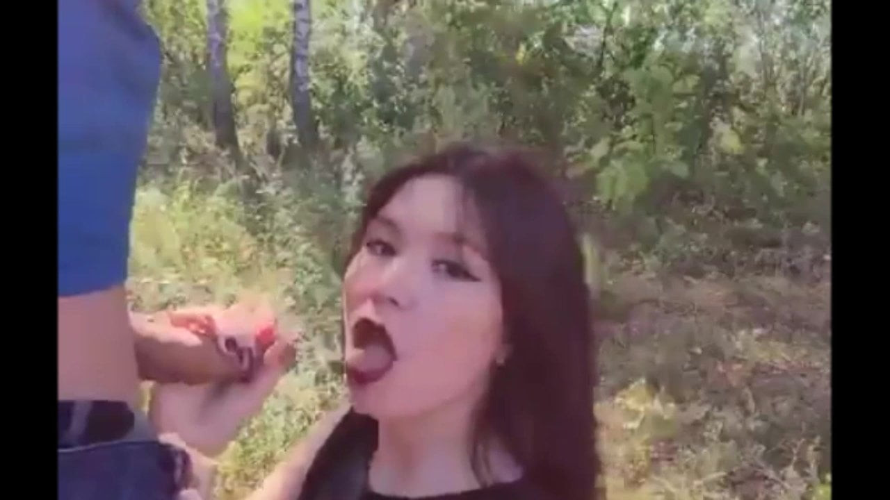 Asian girl loves from behind in the forest