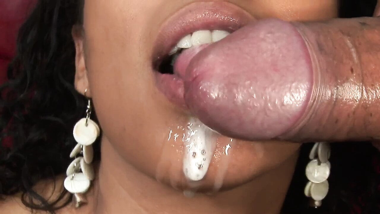 Busty tattooed woman fucking and making black cock cum
