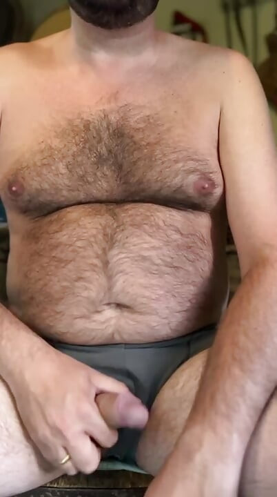 Hairy and gut-strapped cowboy trucker jerks off his small cock