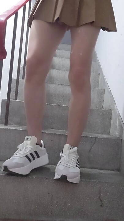 Shemale Ting xuan masturbates with a vibrator inserted in the stairwell.