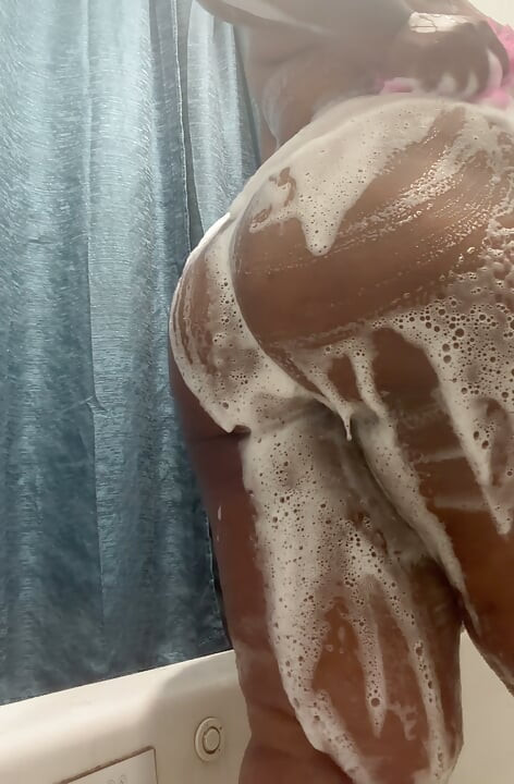 Ebony takes soapy shower
