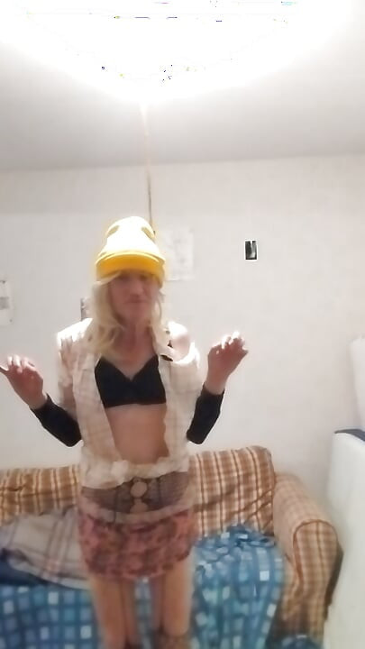 The blonde in the yellow cap shows off all excited...!! ...