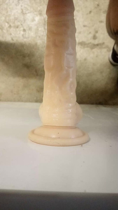 Teddy Bear plays with her dildo