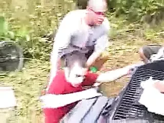 pissing on a guy at a camp out in front of a crowd