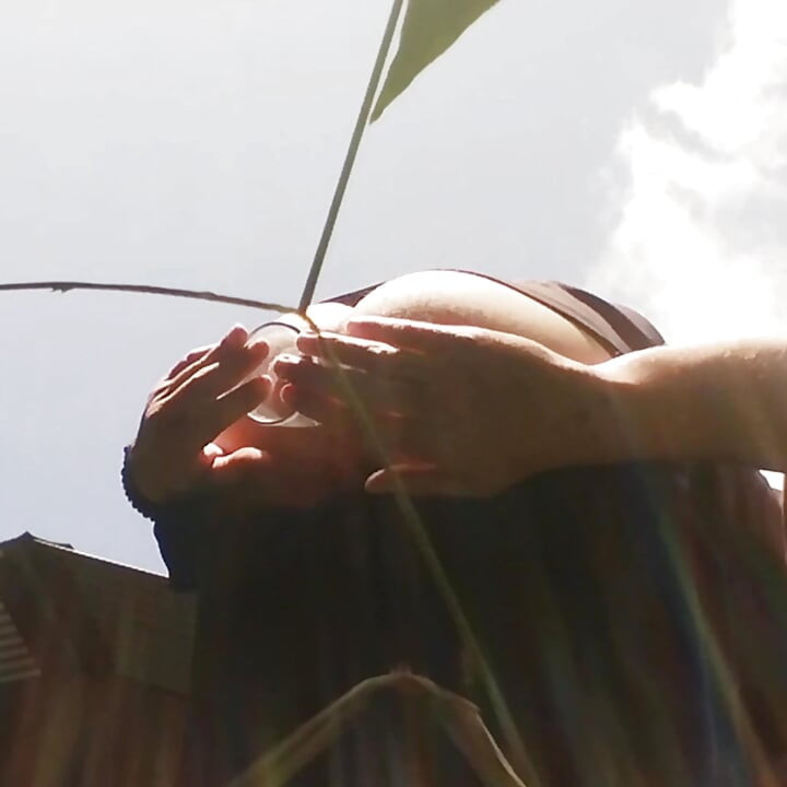 Young boyish man opens his ass