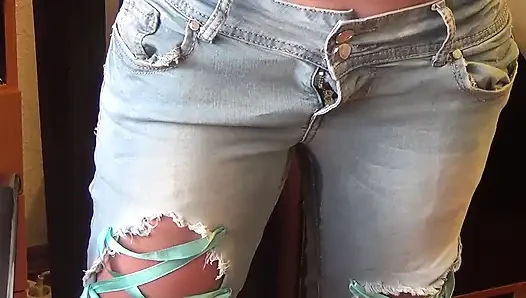 Kate peeing in jeans and masturbating by wet panties till she cum