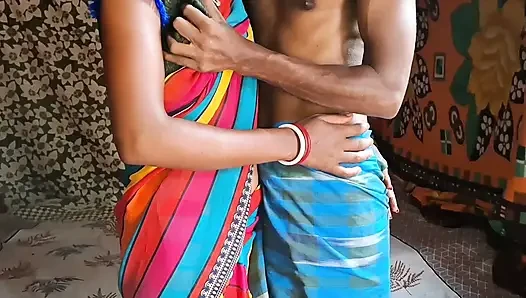 Auntie, clad in a red saree, approaches creating a beautiful and romantic moment filled with love anal sex