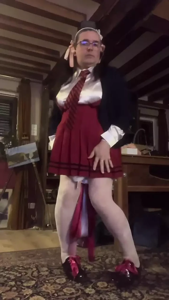 In an outfit with a little red school dress for a disco evening