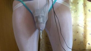 Cumming with e-stim and chastity cage through panties
