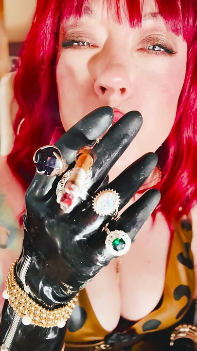 The Beautiful Rubber Beauty Tina Snua Smoking A Cigarette Using A Holder - Smoker Latex Gloves Rings Jewellery