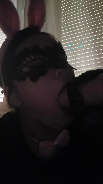 sucking a dildo