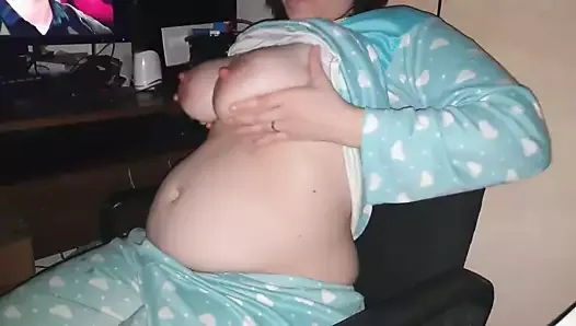 Pregnant tit rubbing