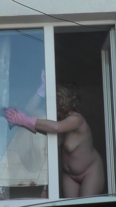 Must-see moment from "Neighbor taxi driver from looks at neighbor MILF who washes window of apartment naked. Nude in public"
