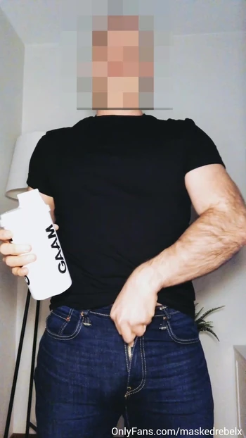 Sexy hunk with a big soft cock makes a protein shake