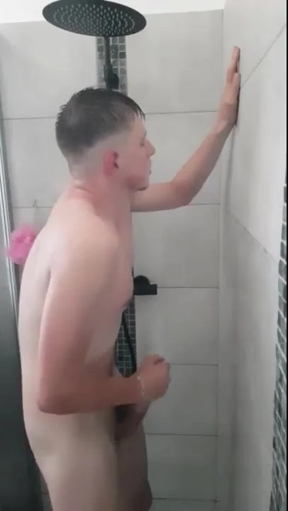 fit as fuck lad wanks and cums in the shower