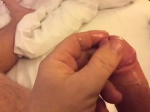 Masturbating