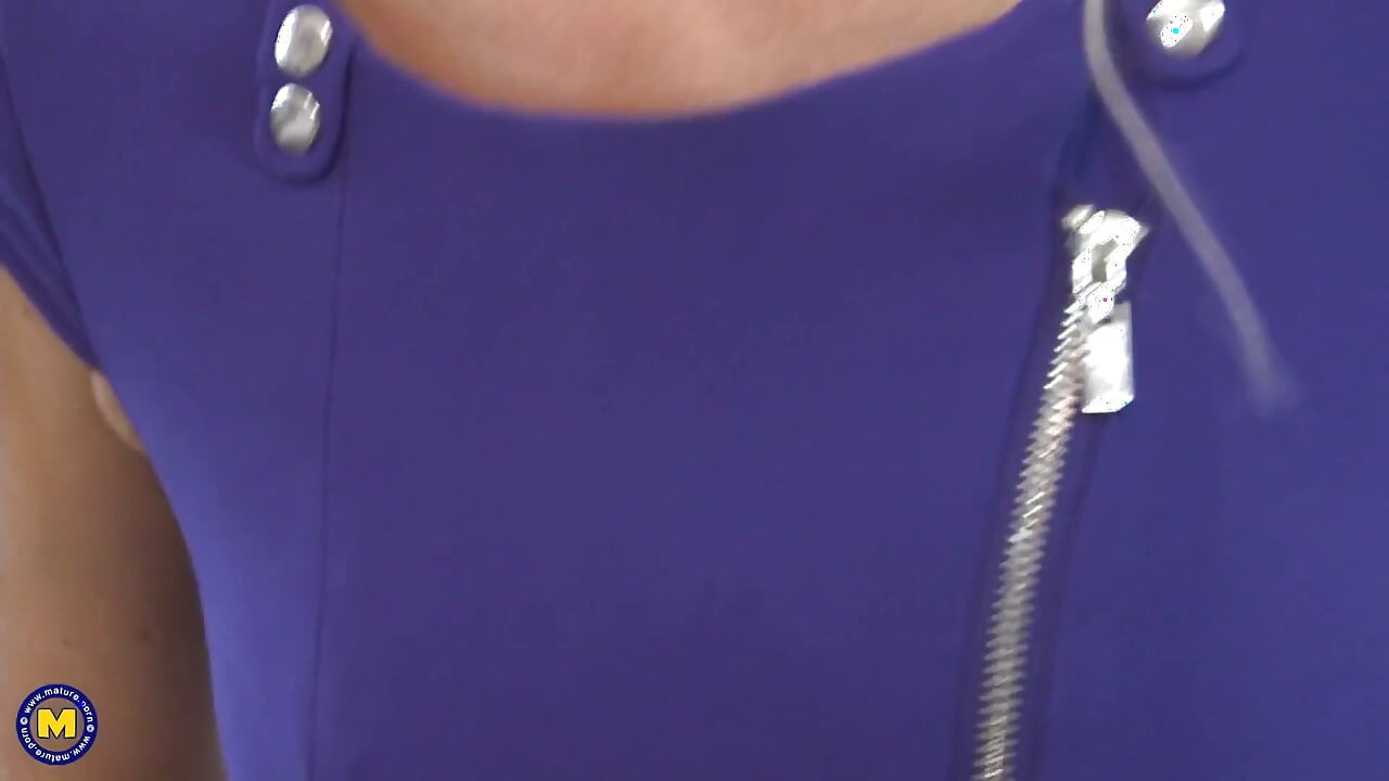 Stunning mature with huge tits pleasures herself