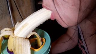 Sucking a banana in my wet mouth