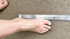 TinySizedFeet Measuring against ruler and home items