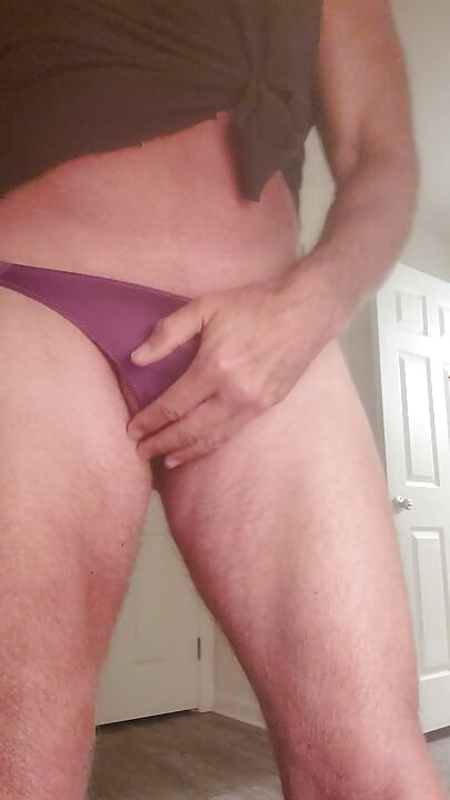 Masterbating in sexy satin thongs.