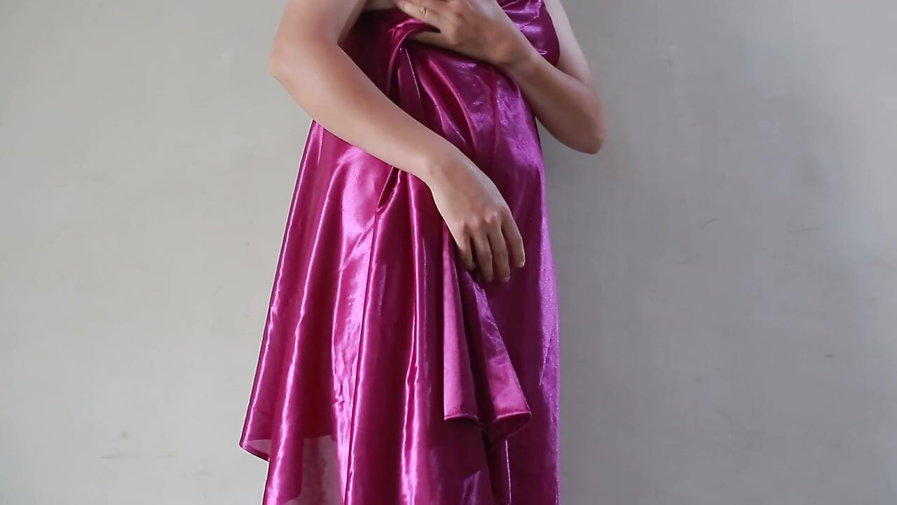 A GIRL WHO WEARS A SEXY SATIN DRESS IN THE LATEST INDO