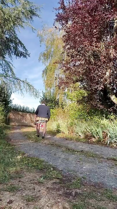 Dressed in a little yellow plaid skirt for a night out