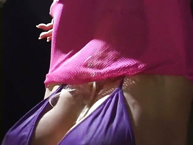 Bubbly blonde in fishnet lingerie enjoys anal masturbation
