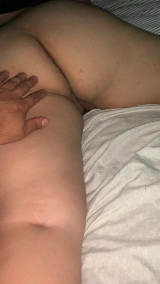 Wife laying in bed