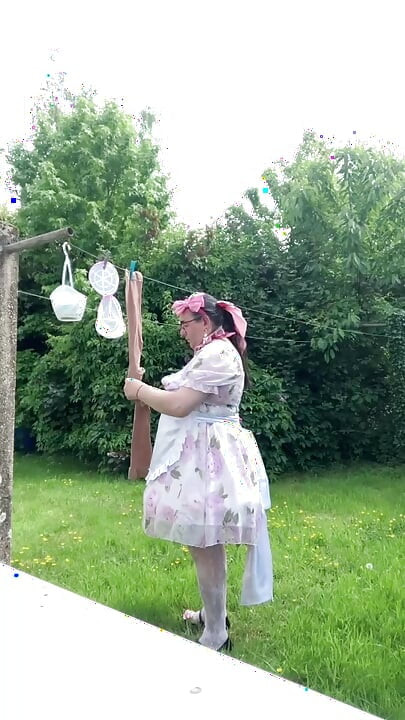 In outfit with a little babydoll dress to hang the laundry.