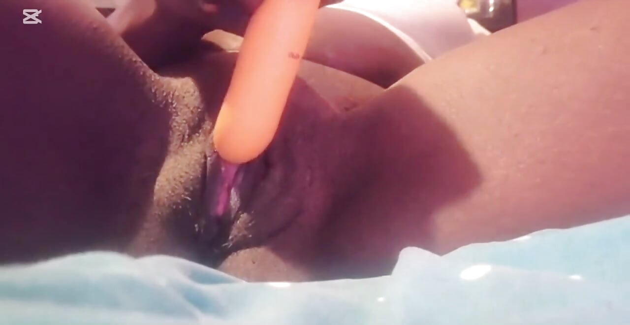 MILF Mia returns from the beach and masturbates her pussy.