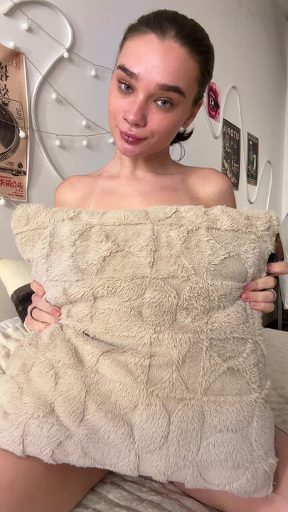 Pierced teen plays with her small tits